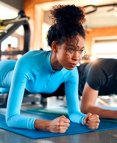 Athletes doing planks — Journey Fitness Wear